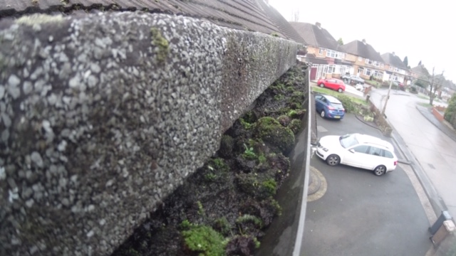 Gutter Cleaning in Castle Bromwich Prevents Sweeping up the Moss