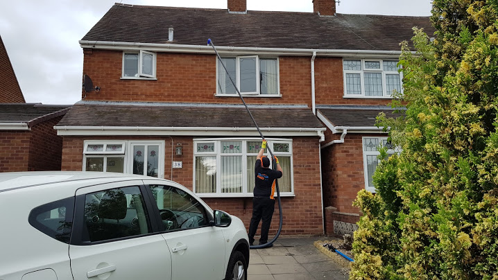 Gutter cleaning in the rain